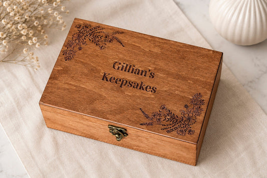 Personalized wooden keepsake box with custom engraved floral design and family name