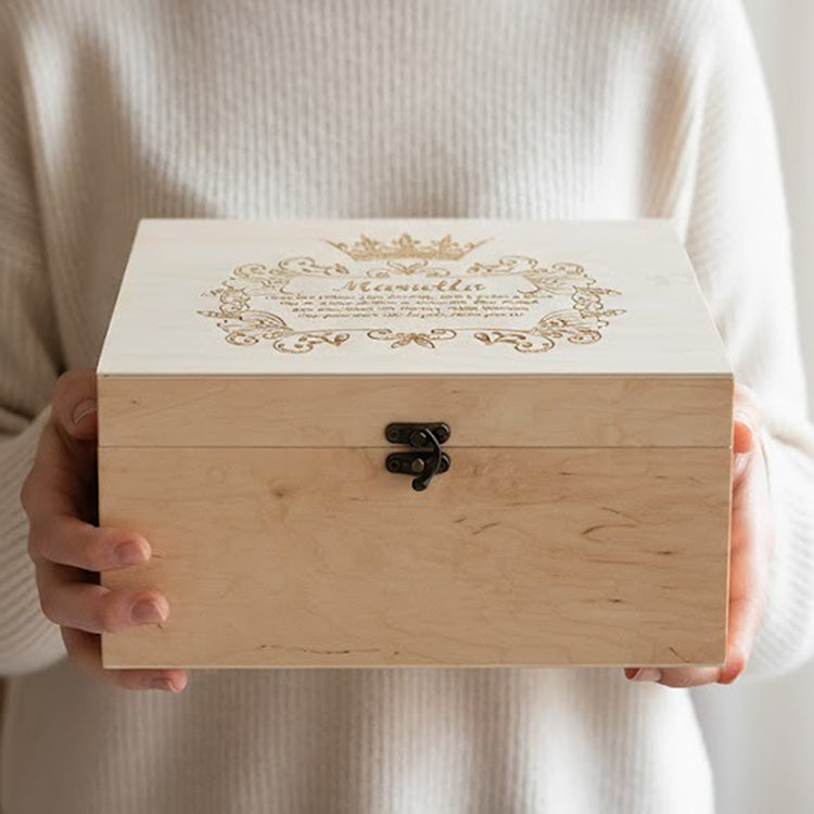 Handcrafted personalized wooden keepsake box for babies. Features an engraved crown design and vintage clasp. Ideal handmade gift for newborns, first birthdays, and nursery memories. High-quality custom wood chest for kids' mementos.