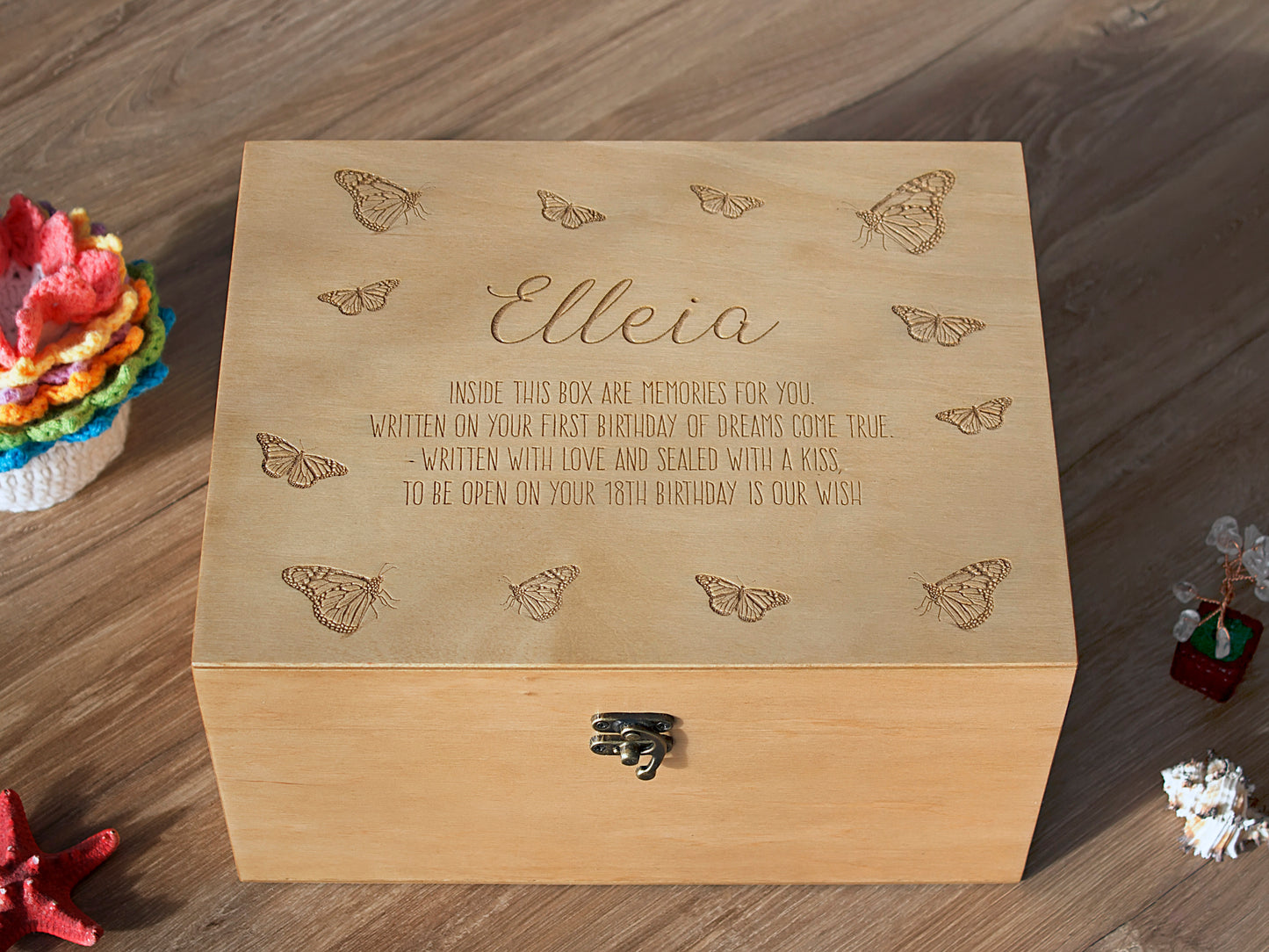Close-up of custom engraved baby memory box with personalized name