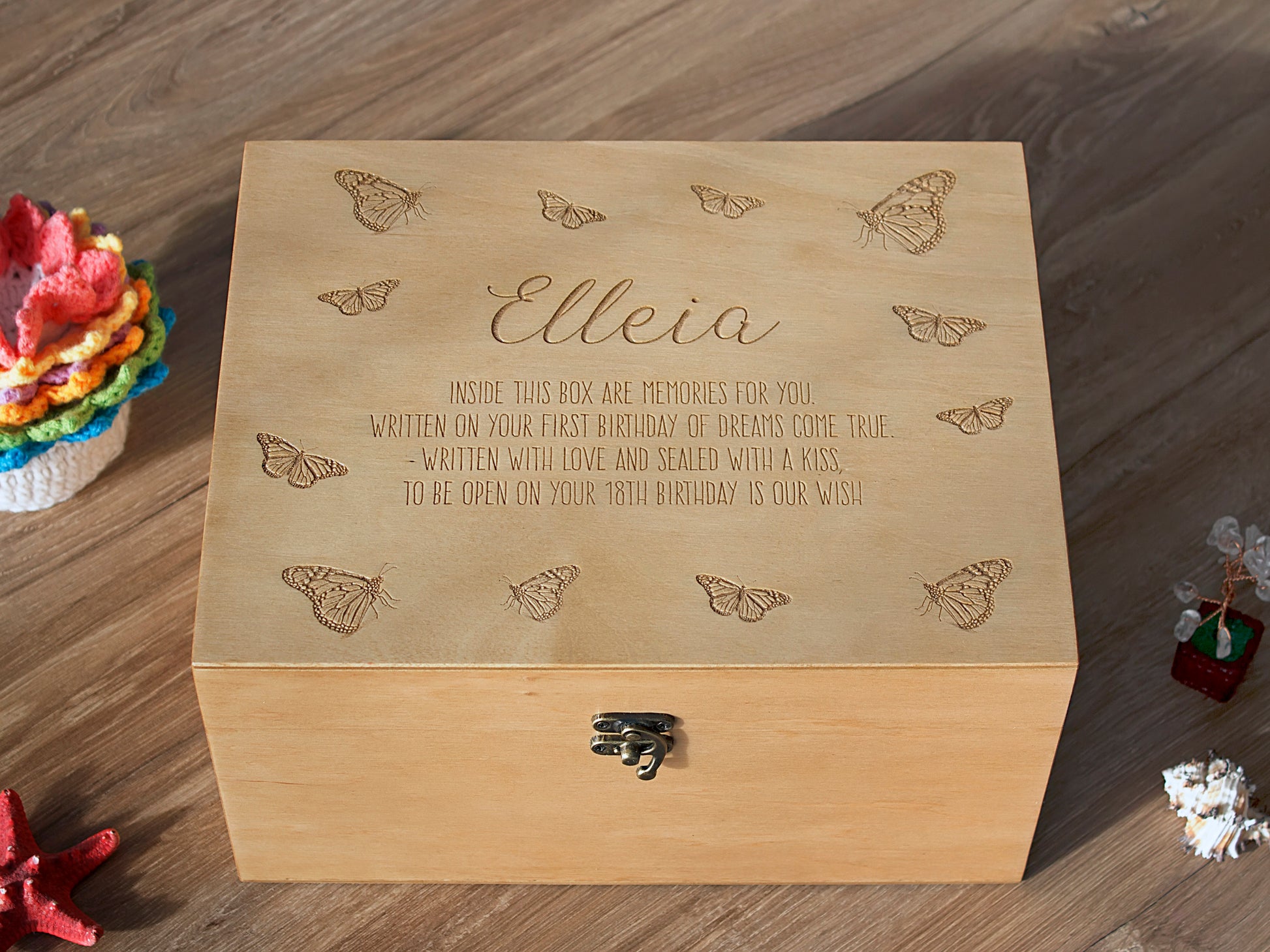 Close-up of custom engraved baby memory box with personalized name