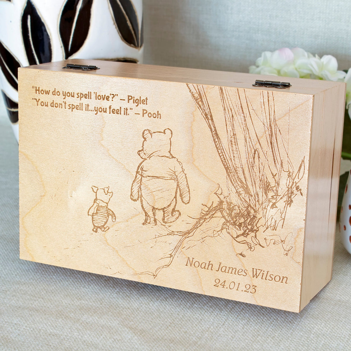 Personalized Winnie the Pooh baby memory box engraved with a child's name