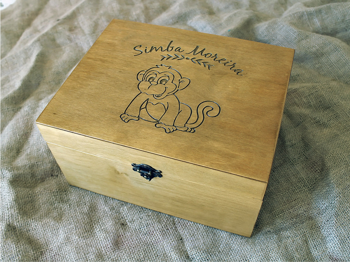 Engraved monkey baby keepsake box with personalised name, close angled view
