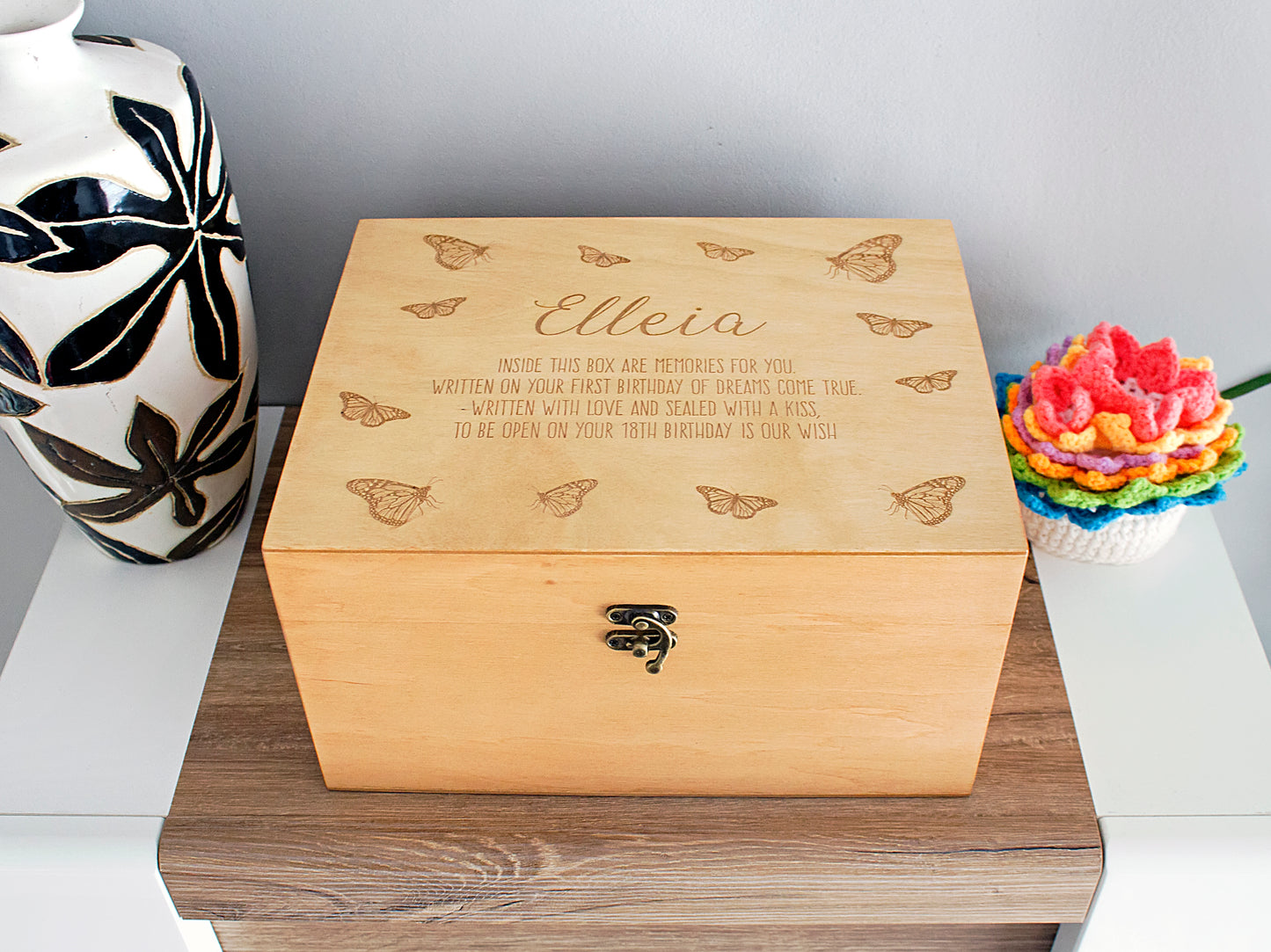 Personalized wooden baby memory box engraved with a child's name