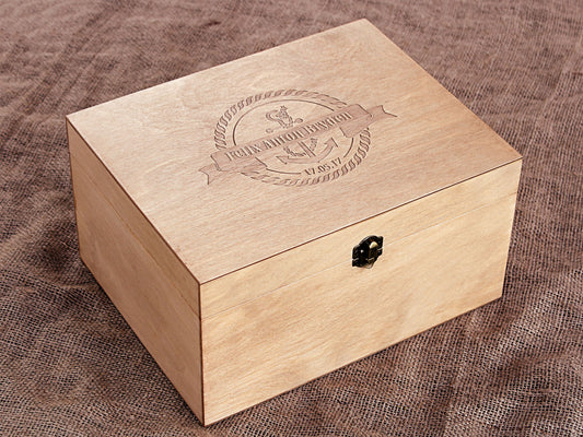 Personalized nautical baby keepsake box with an engraved anchor design