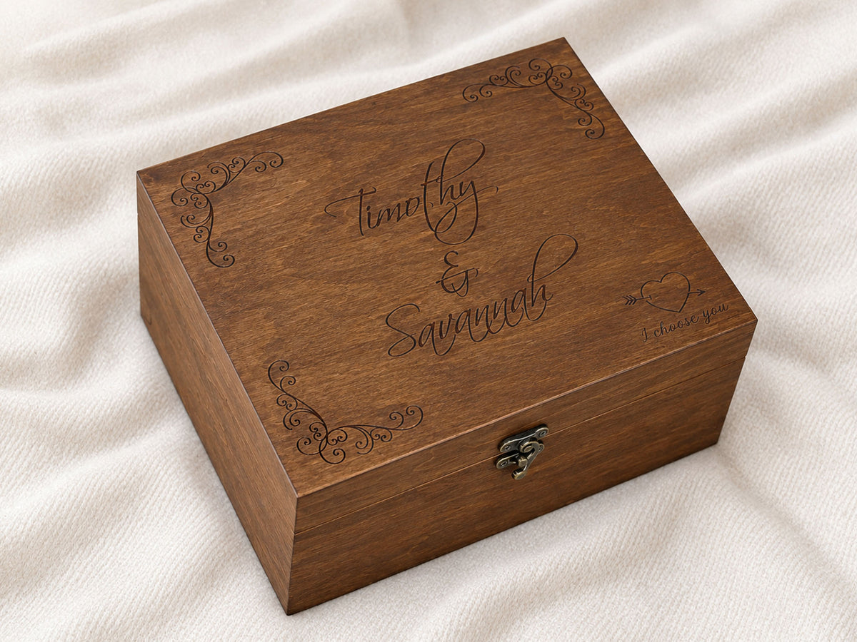 Wooden wedding keepsake box with decorative scroll design in the corners