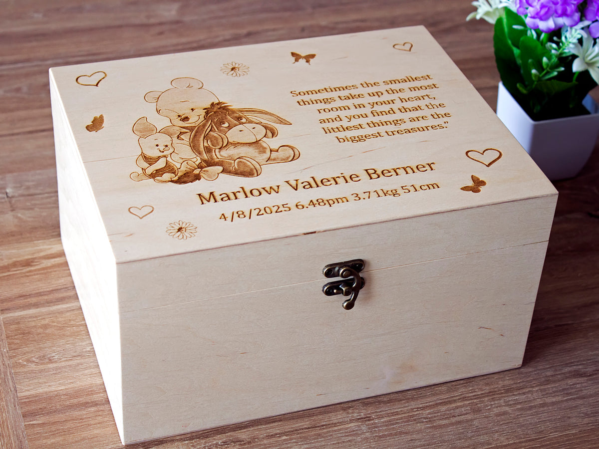 Custom designed Winnie the Pooh baby memory box with engraved artwork and name