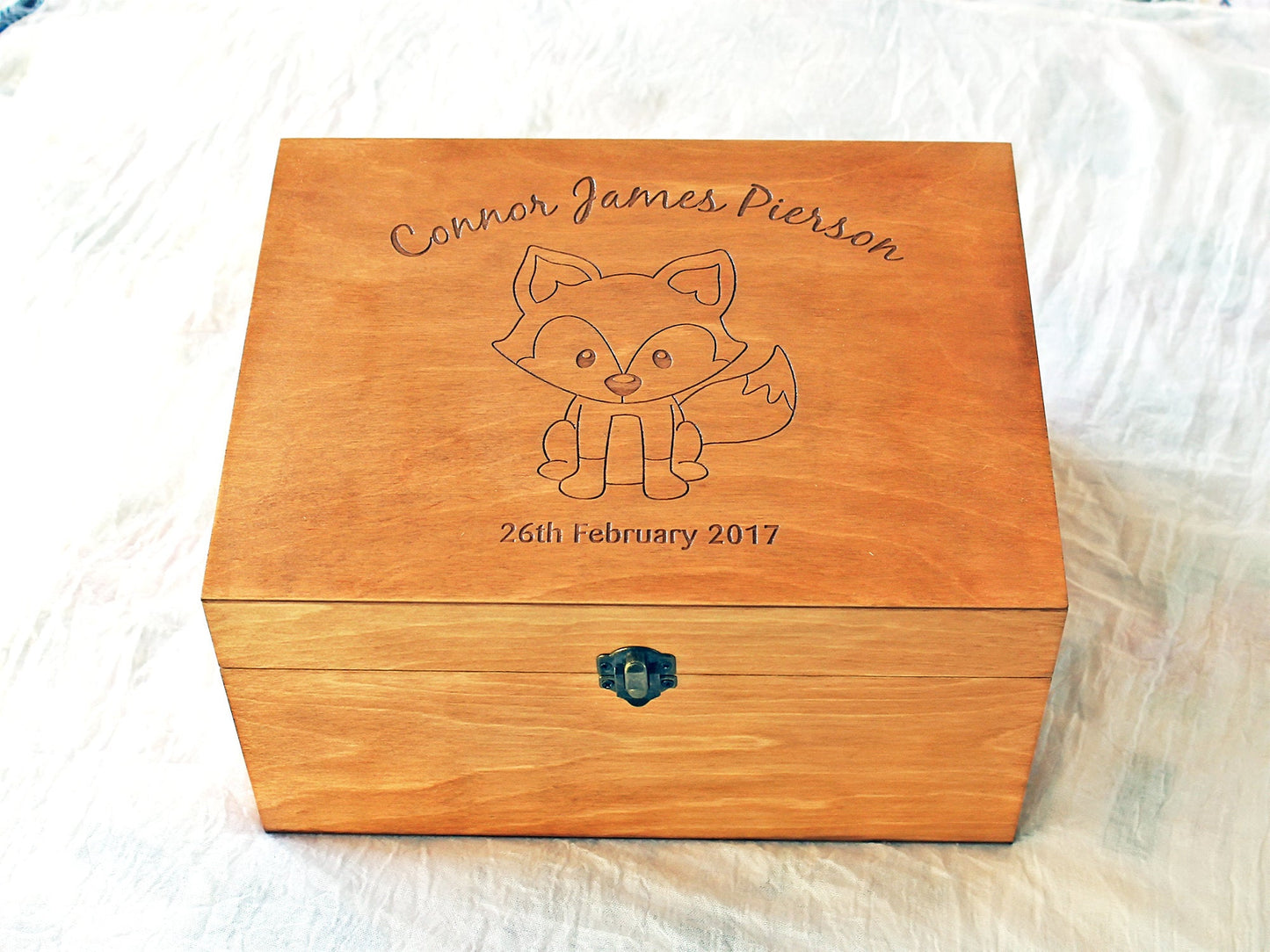 Wooden baby memory box featuring an engraved fox and personalized details