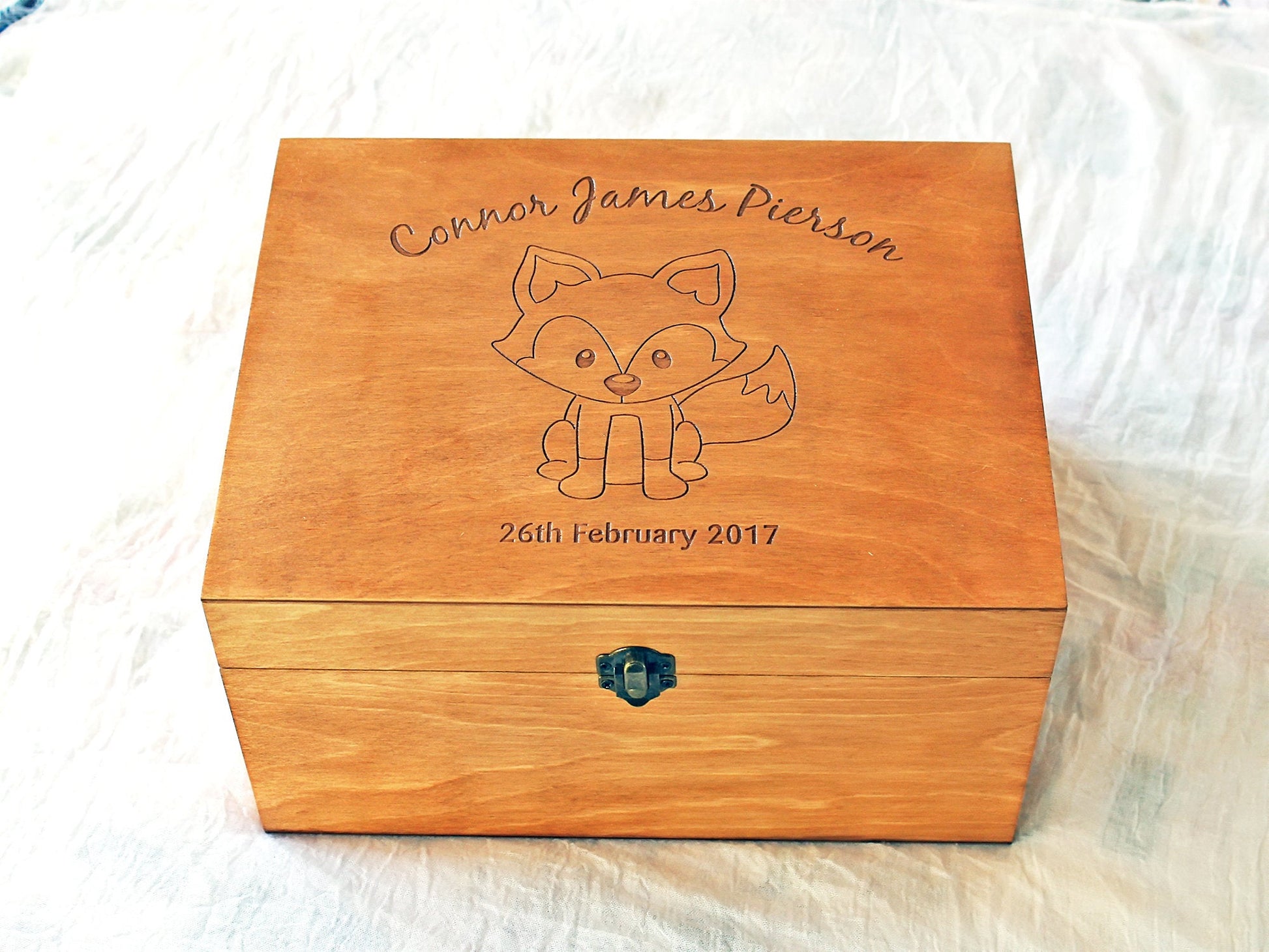 Wooden baby memory box featuring an engraved fox and personalized details