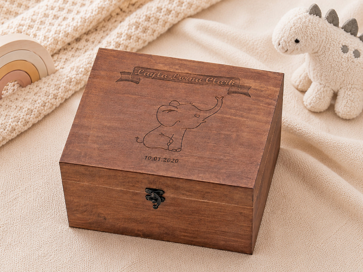 Wooden baby keepsake box featuring an elephant illustration engraved on the lid