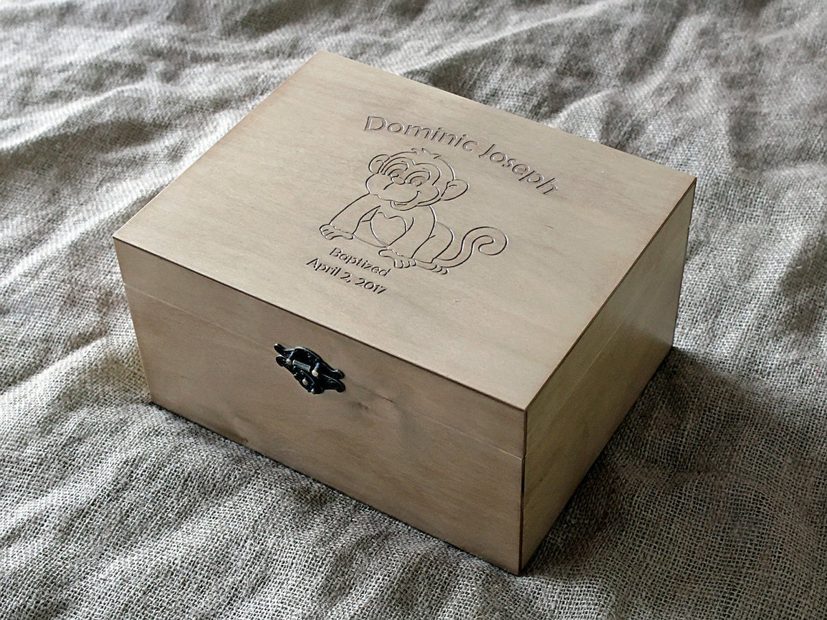 Baby memory box with engraved monkey design
