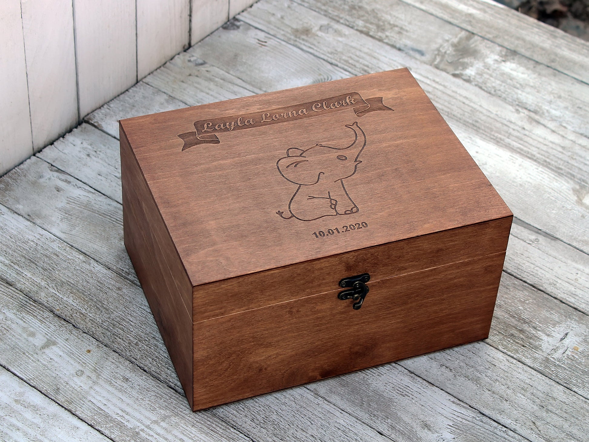 Custom wooden baby box with engraved elephant design and name