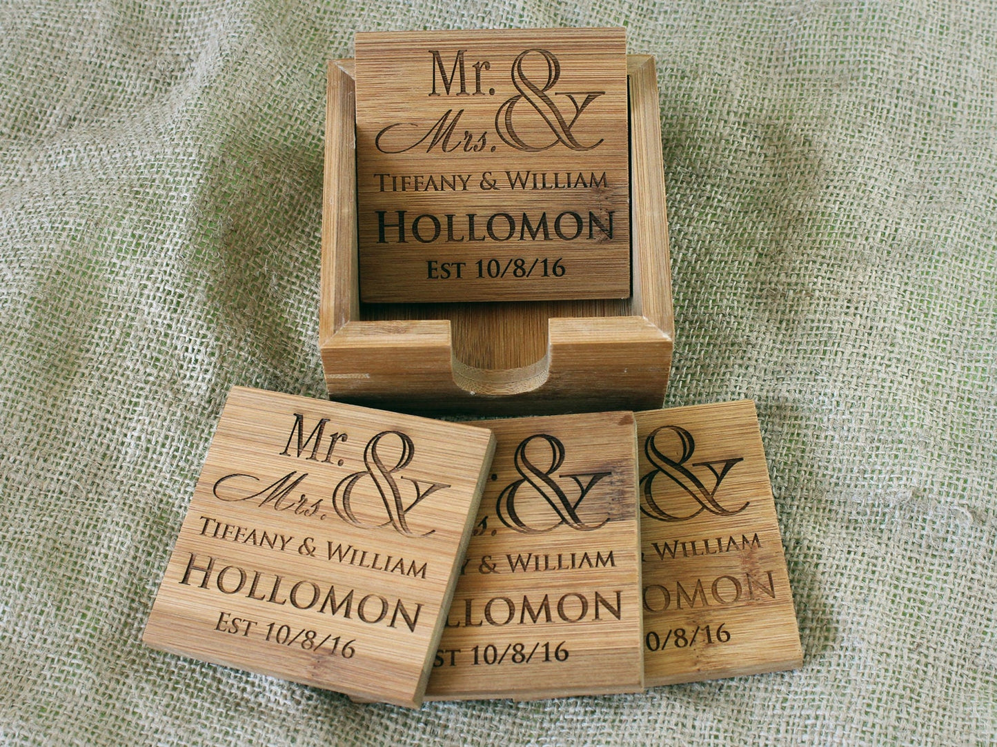 Close-up of a custom engraved bamboo coaster with personalized text