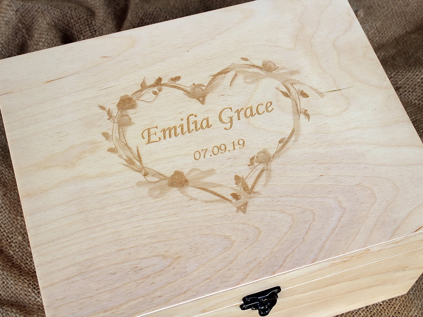 Close-up of a personalized memory box with custom laser engraving