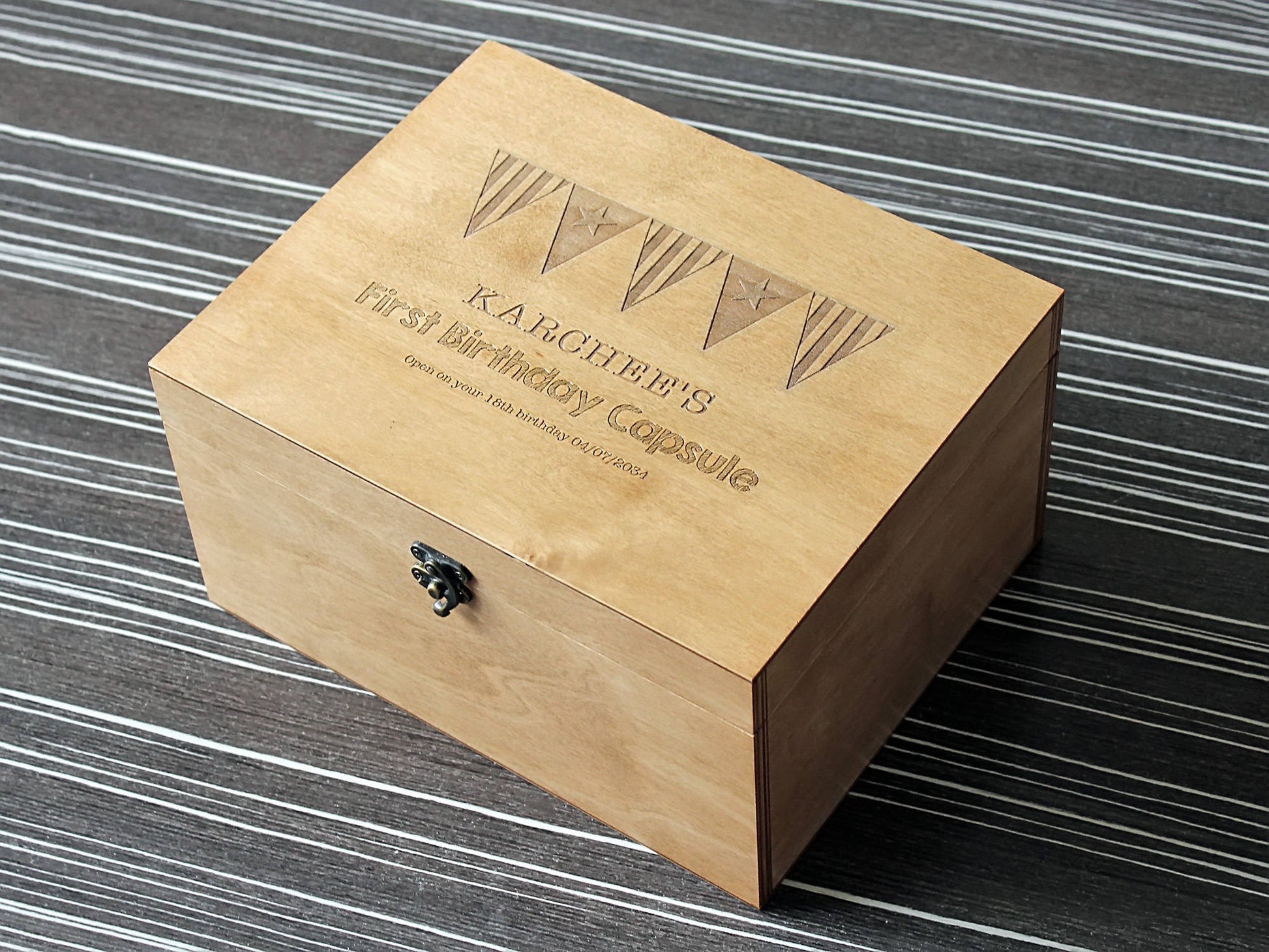 Personalized wooden time capsule box with custom engraved design