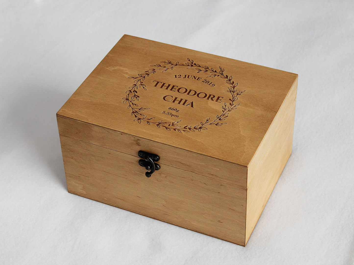 Custom engraved keepsake box with personalized wreath design and name