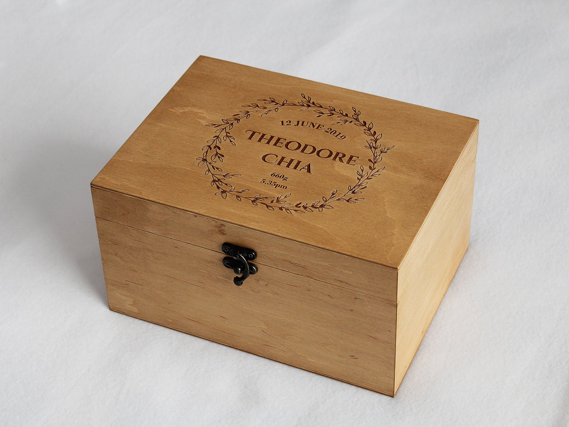 Custom engraved keepsake box with personalized wreath design and name
