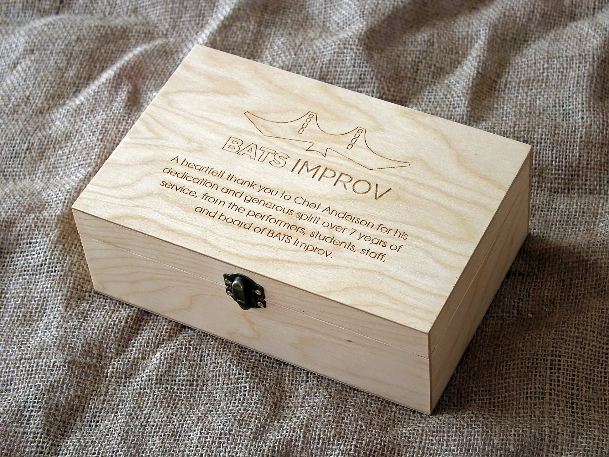 Light wood gift box with custom engraved text and design