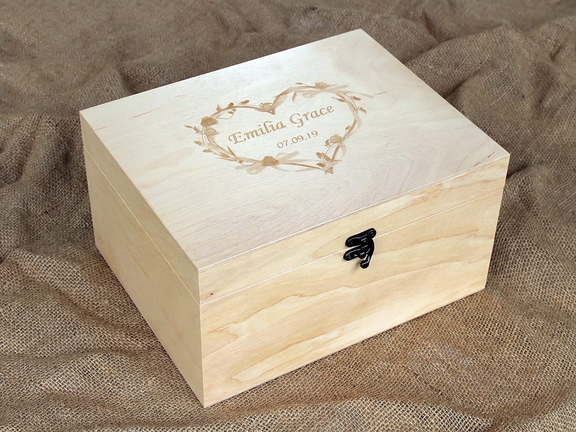 Personalized wooden keepsake box with spacious interior for treasured memories