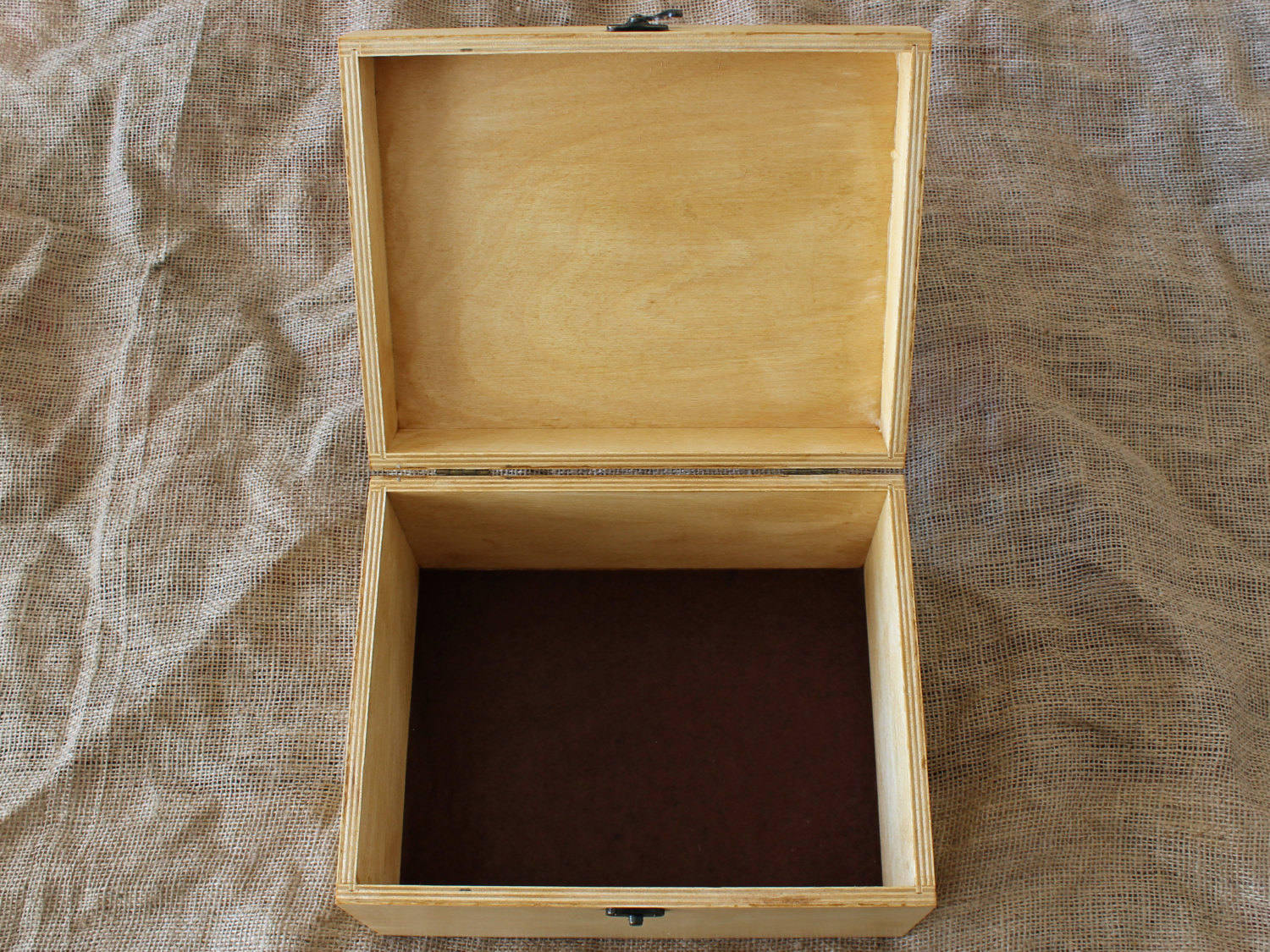 Custom wooden memory box designed as a personalized time capsule