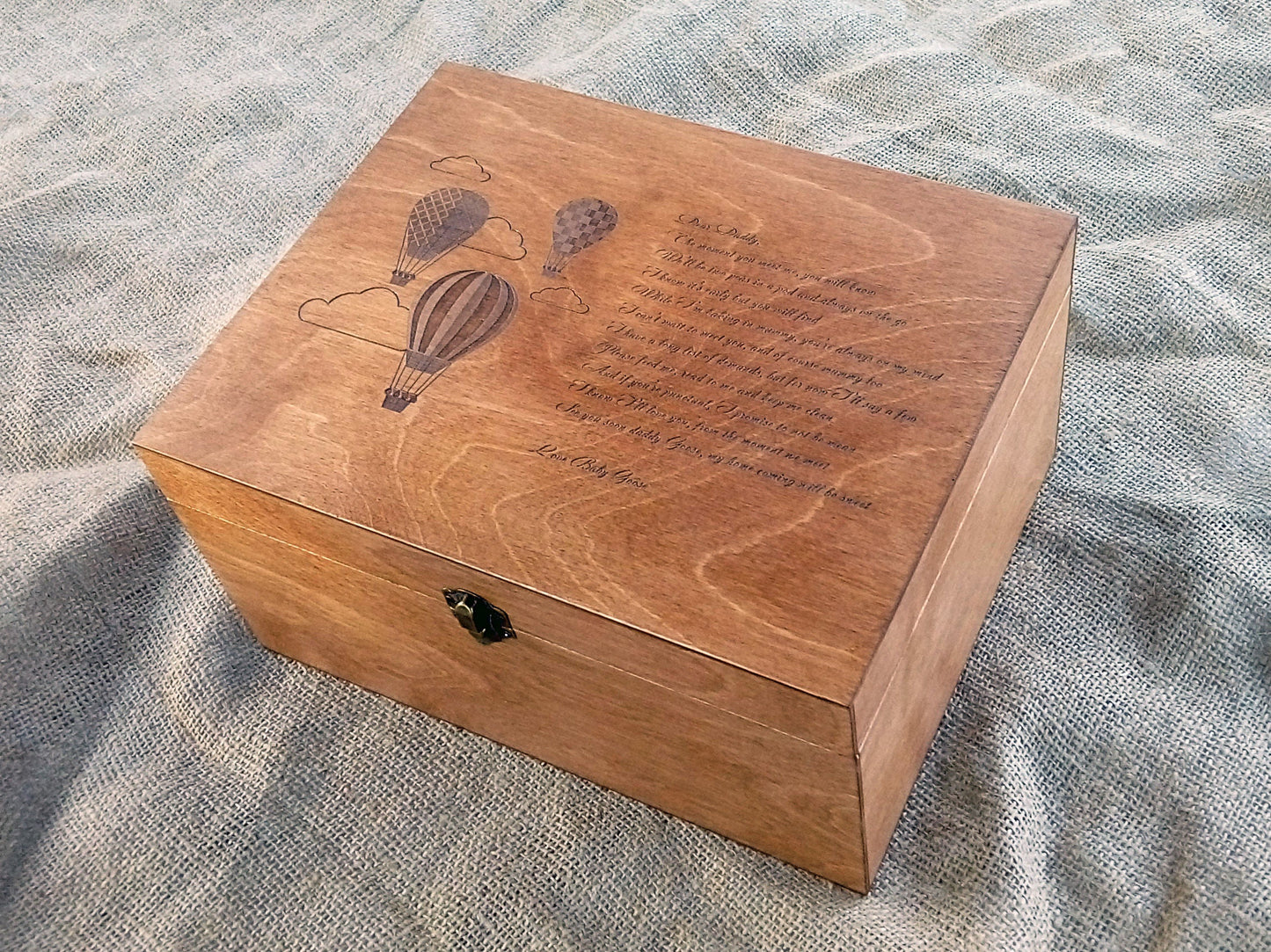 Wooden baby keepsake box featuring a personalized hot air balloon engraving