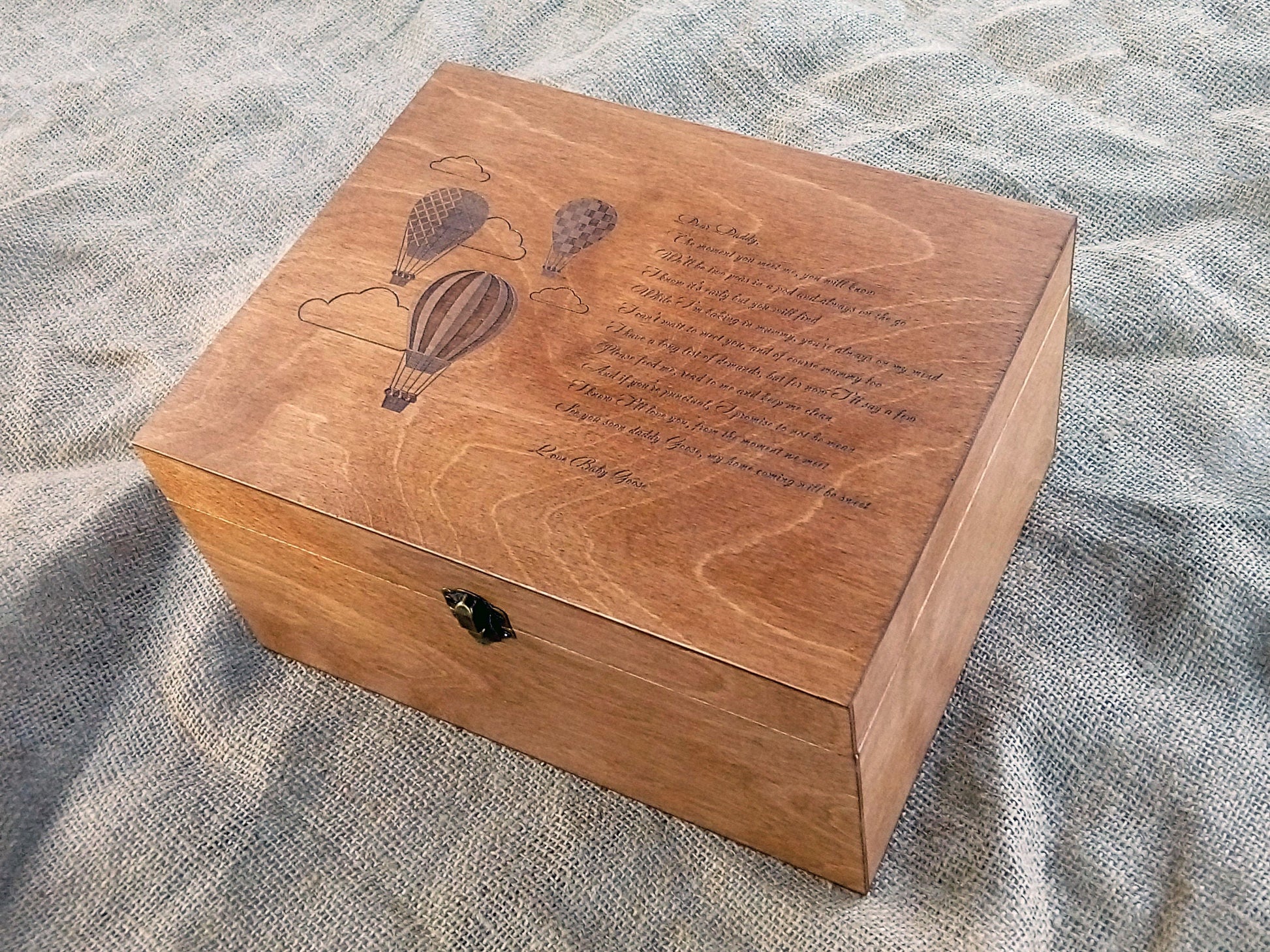 Wooden baby keepsake box featuring a personalized hot air balloon engraving