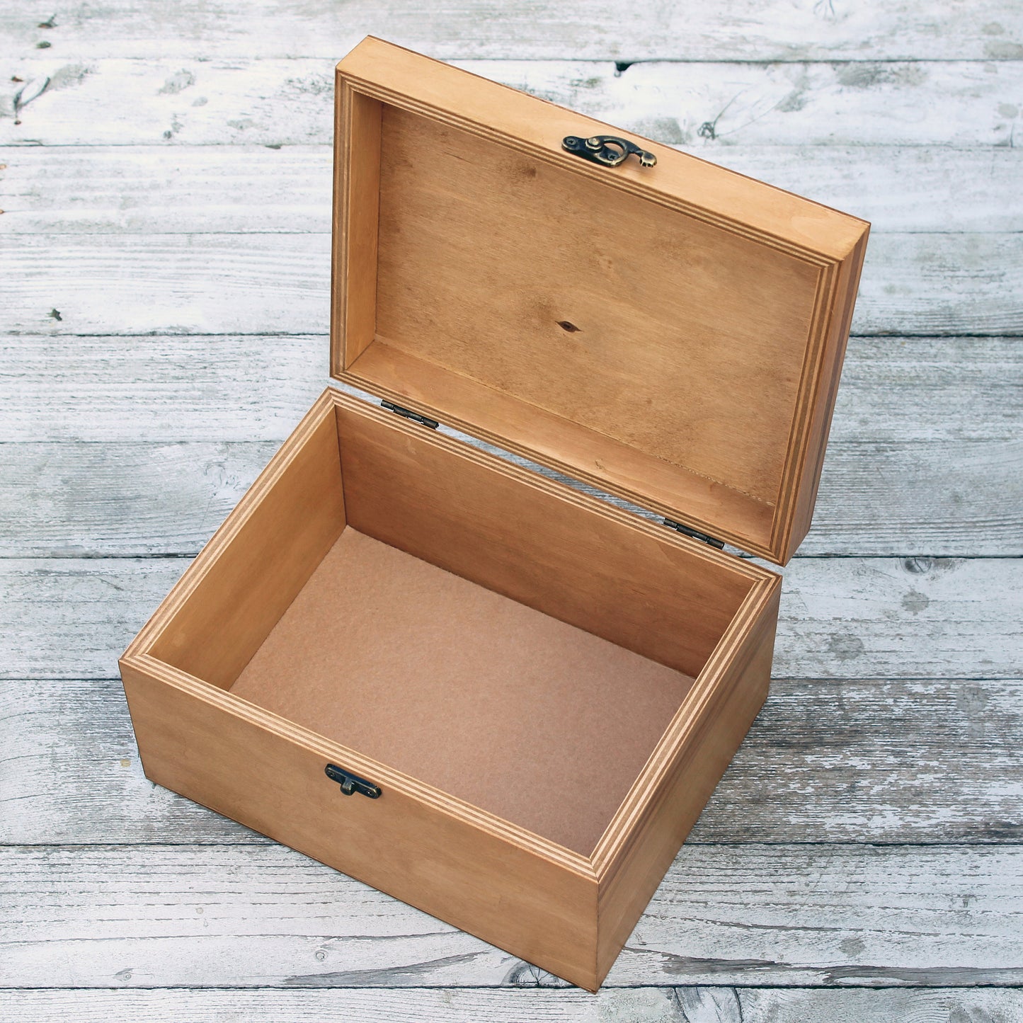 Open personalized wooden baby memory box showing the spacious interior