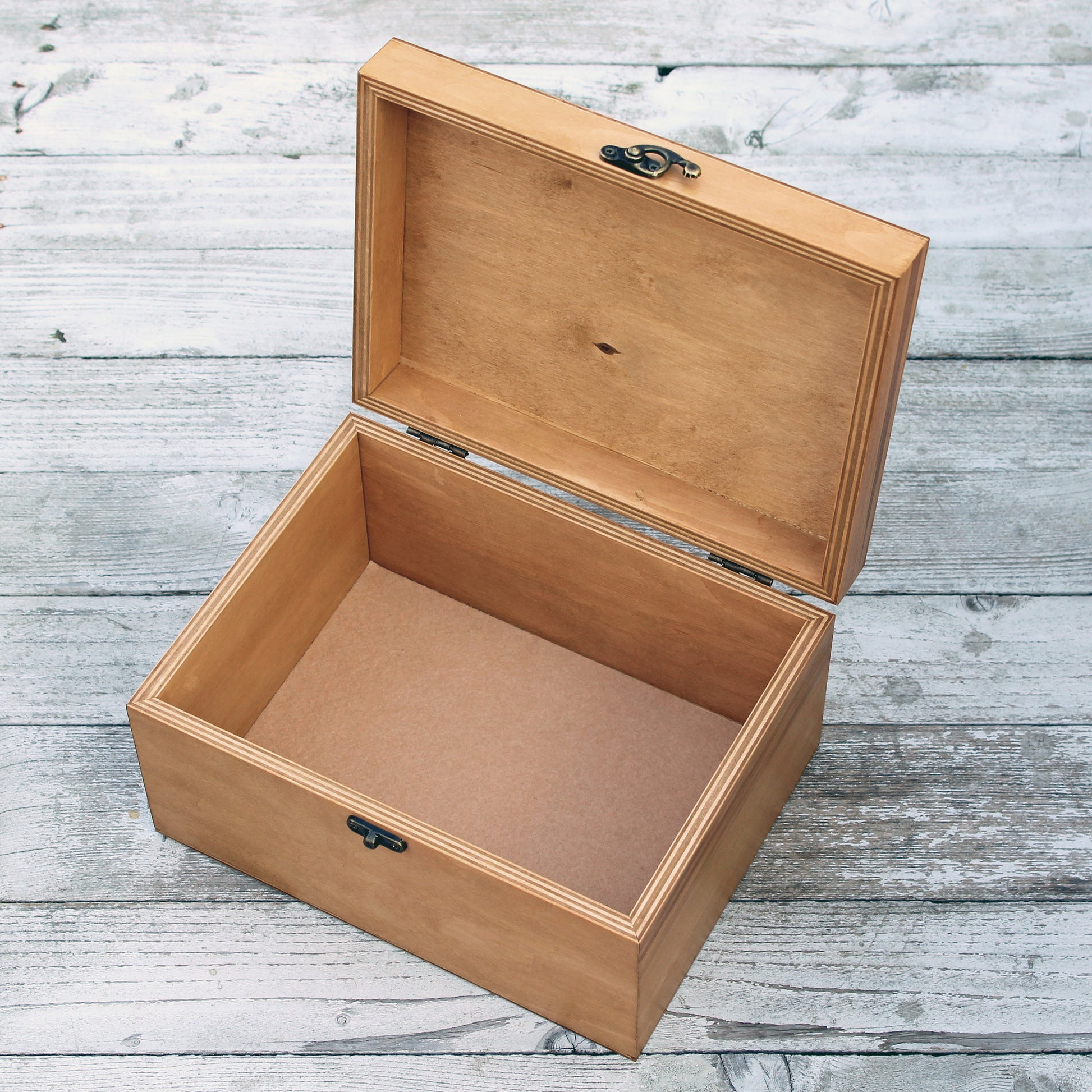 Open personalized wooden baby memory box showing the spacious interior