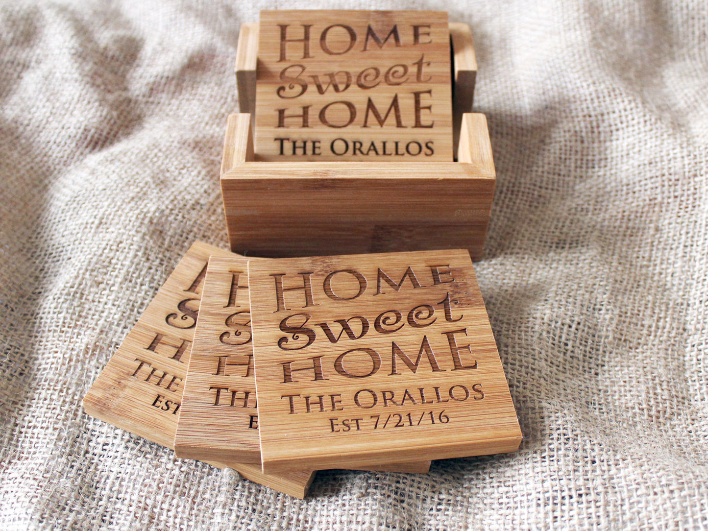 Personalized bamboo coaster set with Home Sweet Home engraving and matching holder