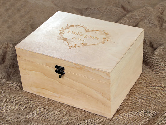 Personalized wooden memory box engraved with a custom name and floral design