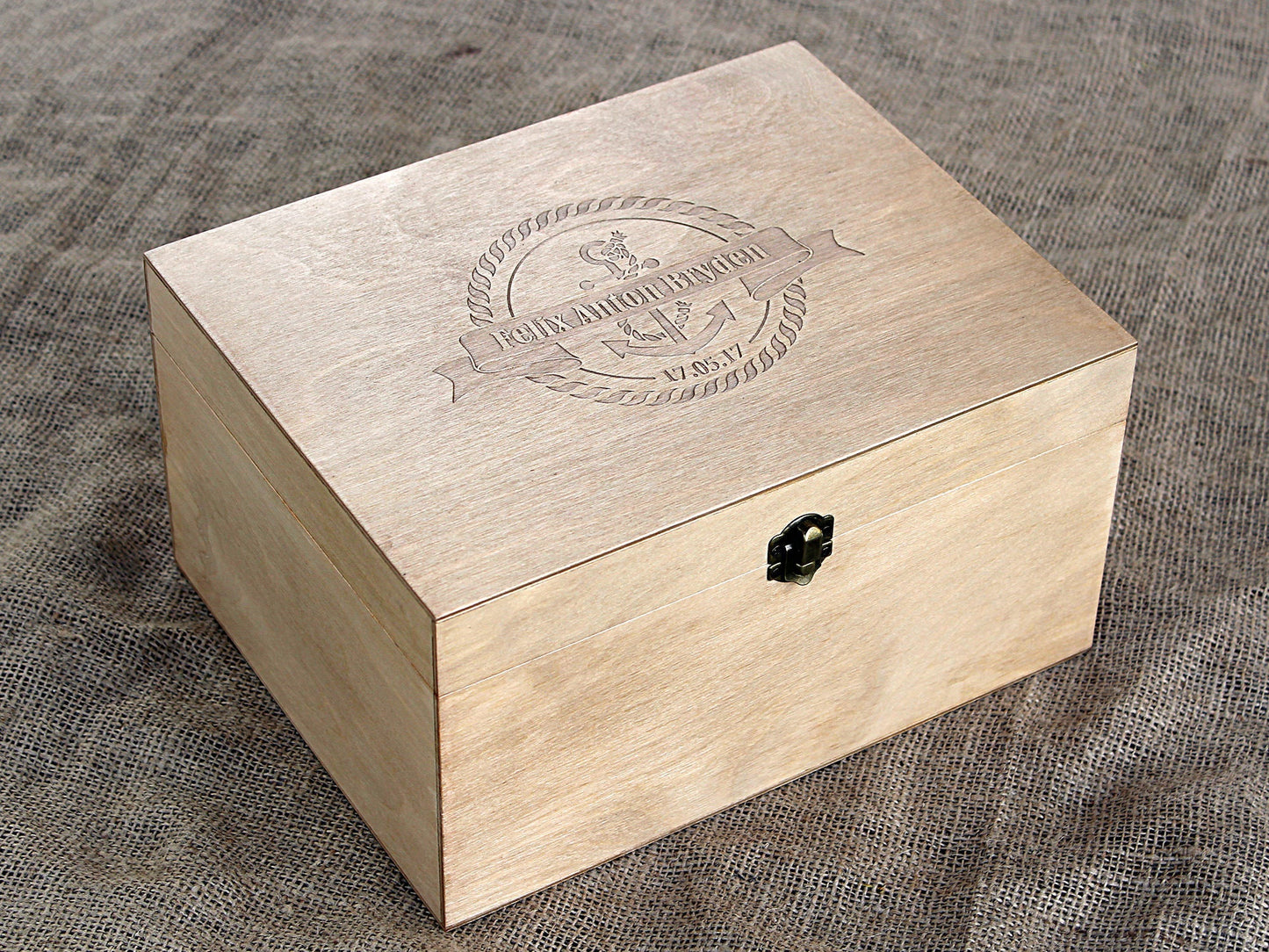 Personalized nautical baby memory box with engraved anchor design and child's name