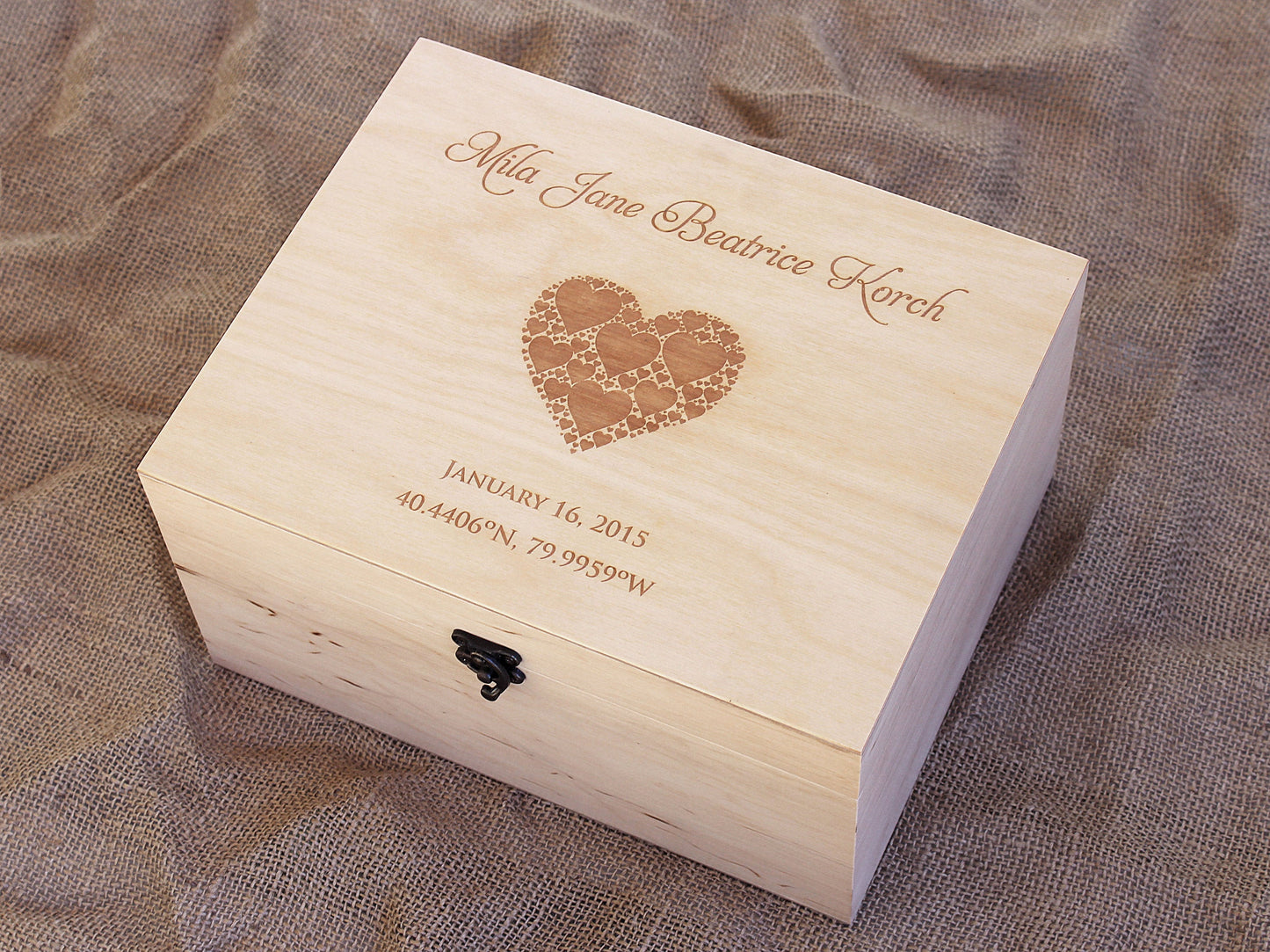 Personalized wooden baby keepsake box with engraved heart design and baby name