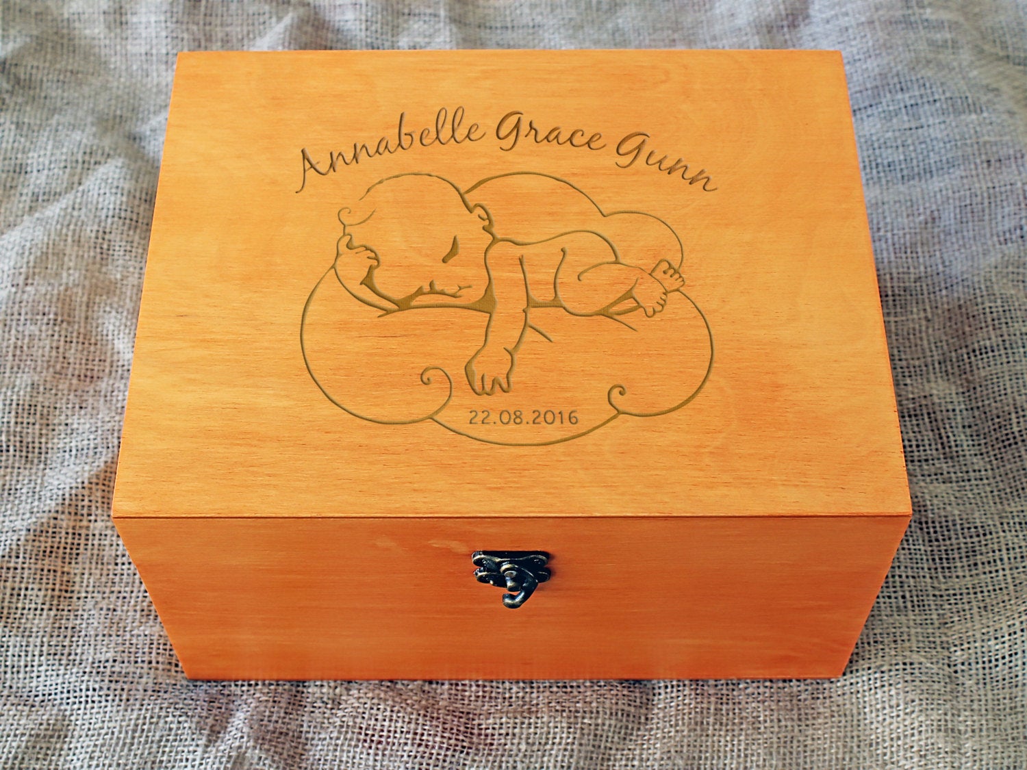 Wooden baby memory box featuring a sleeping baby and cloud