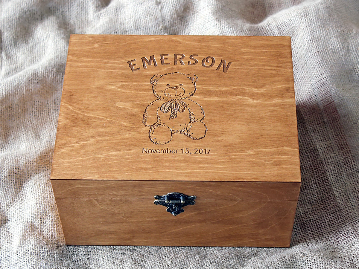 Wooden baby keepsake box featuring an engraved teddy bear design