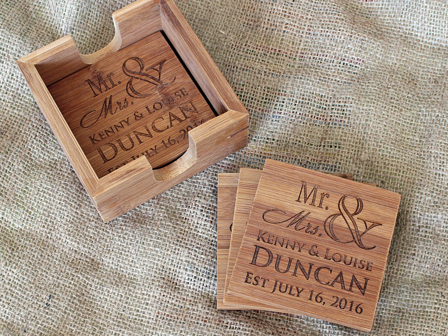 Close-up of a personalized bamboo coaster with custom engraved text