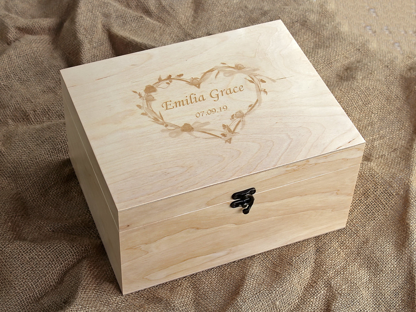 Personalized wooden memory box displayed as a custom birthday gift